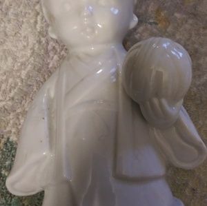 Toto porcelain figurene girl holding ball of yarn